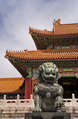 Image showing Beijing Forbidden City: lion against the corner of a roof.