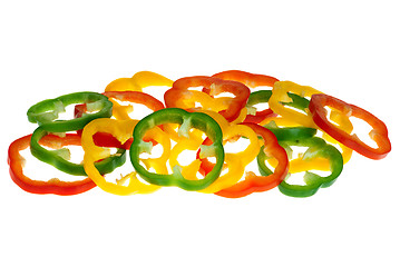 Image showing Red, yellow and green bell pepper slices