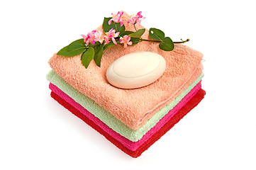 Image showing A pile of towels and soap