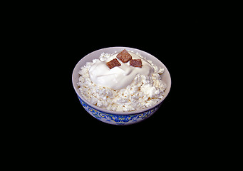 Image showing Bowl with curd and cane sugar