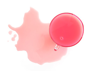Image showing Glass cup with a pink drink