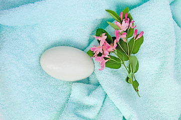 Image showing Soap on a blue towel