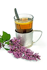 Image showing Tea in a glass with lilac