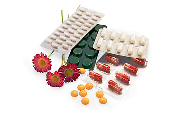 Image showing The set of drugs with daisies