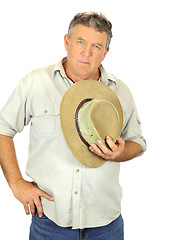 Image showing Man Holding Hat