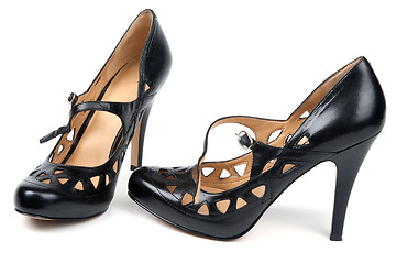 Image showing Black feminine loafers on high heel