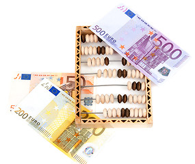 Image showing Wooden abacus and bills euro