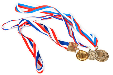 Image showing Three medals for first place with tape