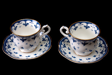 Image showing Two tea cups on saucer