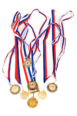 Image showing Golden medals with tape