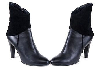 Image showing Black feminine leather boots with suede insertion