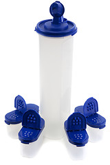 Image showing Saltcellar and plastic bottle