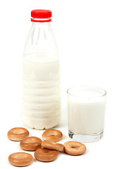 Image showing Bottle and glass milk with bagel