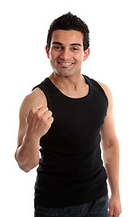 Image showing Smiling man success fist