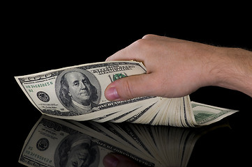 Image showing hand with dollars