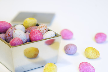 Image showing Mini candy chocolate eggs in a polished silver box