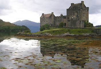 Image showing Eilean Donan Castle reflected in the water