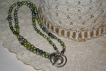 Image showing Necklace and hat