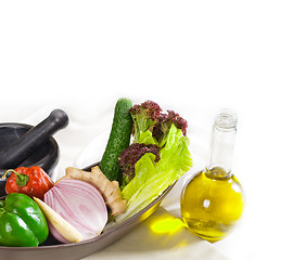 Image showing assorted vegetables and extra virgin olive oil