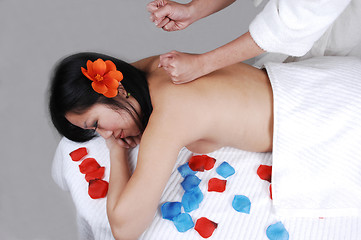 Image showing Chinese girl getting massage.