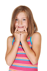 Image showing Young girl mimic a smile.
