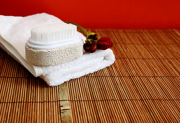 Image showing Pumice brush and towel at a spa - copy space