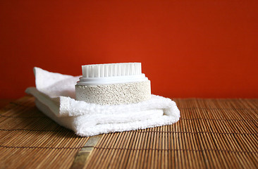 Image showing Pumice brush and towel at a spa - health and beauty