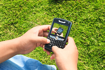 Image showing man using cellphone