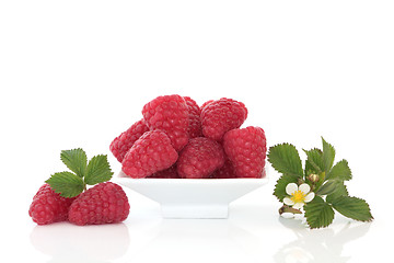 Image showing Raspberries and Flower Leaf Sprigs