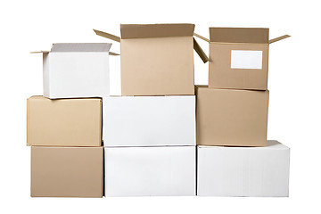 Image showing Brown and white different cardboard boxes arranged in stack