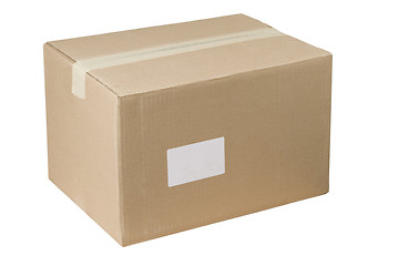 Image showing closed shipping cardboard box whit white empty label