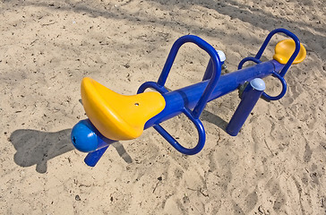 Image showing An empty seesaw in a playground