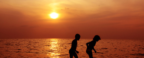Image showing Children, sea and sunset
