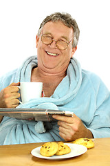 Image showing Middle Aged Man At Breakfast