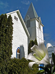 Image showing Easter lily and church