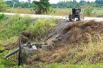 Image showing Simple irrigation pump in rural area