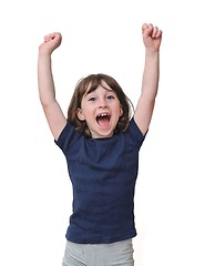 Image showing Cute little years girl raises her hands in a victory sign isolated