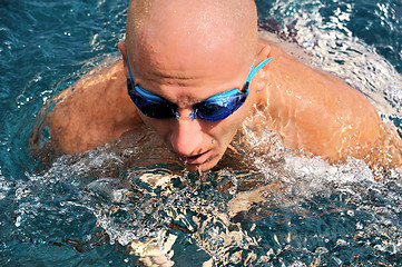 Image showing Detail of young man swimming