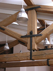 Image showing Lamps and roof timbers