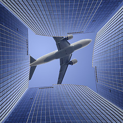 Image showing airplane and the modern building