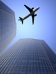 Image showing airplane and the modern building