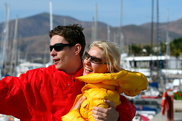 Image showing young man and woman in the port 