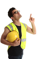 Image showing Building construction worker lookin up pointing