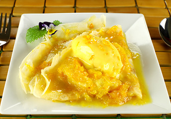 Image showing Orange Crepes With Ice Cream