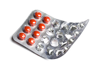 Image showing red pills isolated on white 