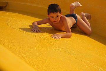 Image showing Boy on water slide