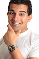 Image showing Happy smiling man wearing watch