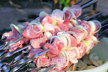 Image showing barbecue - raw meat on spits