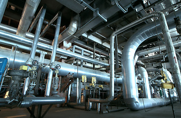 Image showing Equipment, cables and piping as found inside of a modern industr