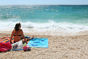 Image showing Middle age woman in the beach